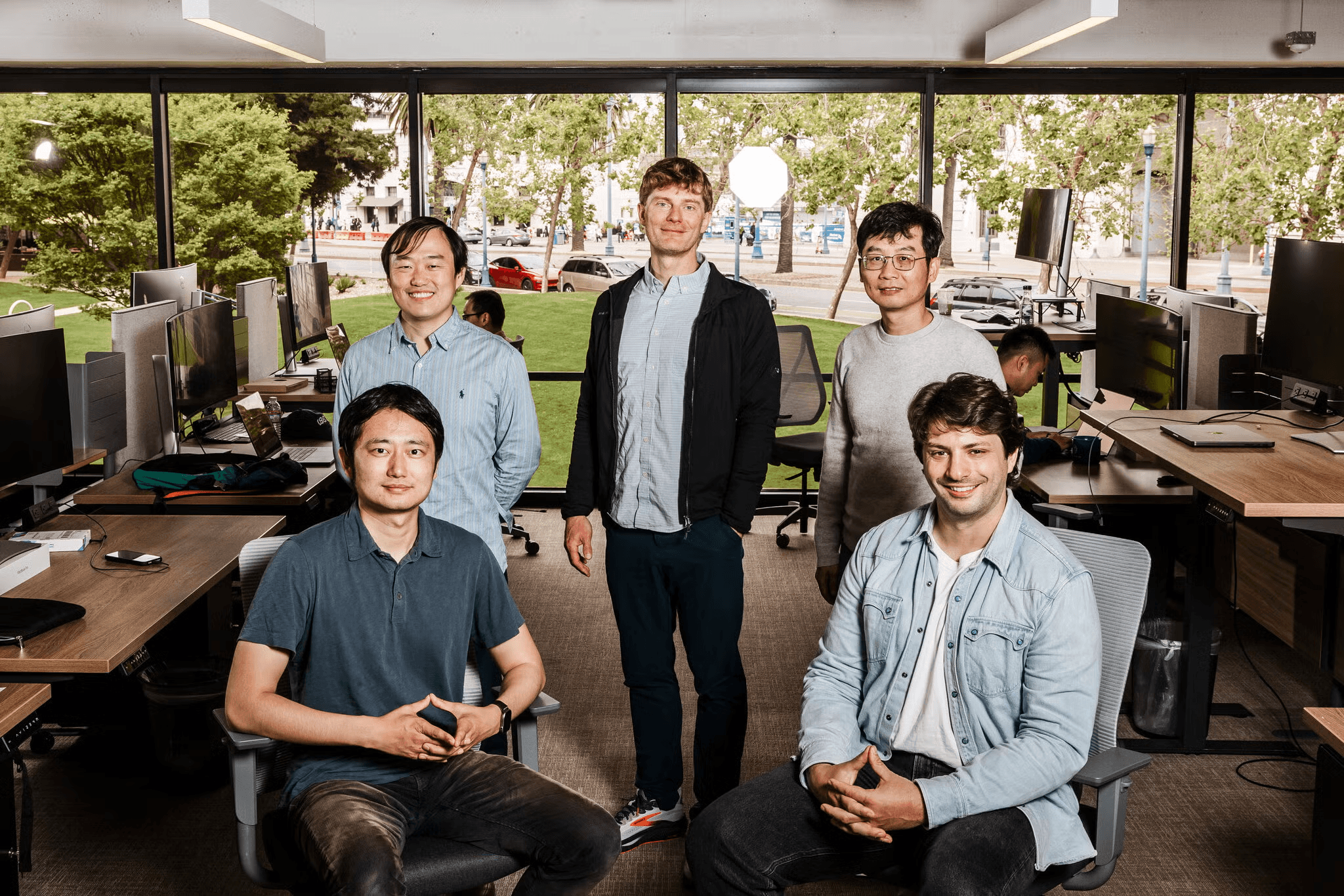 The Recursive team in their office. (Image: Recursive, announcement)
