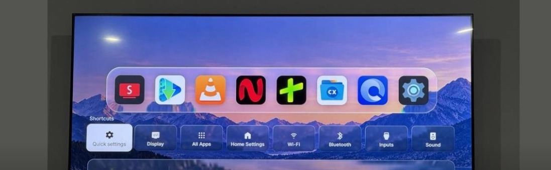 A modern TV's home launcher, the actual battlefield: settings live behind icons, ads live behind the launcher. (Image: GsmDome, Oct 26, 2026)